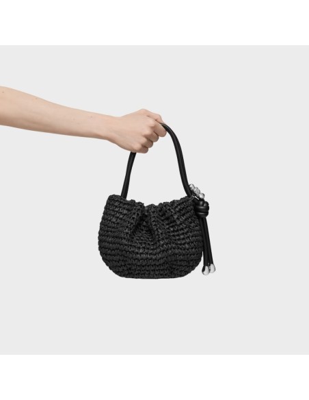 Bombonera negra de rafia TOUS Daisy – Frescura natural con estilo urbano
