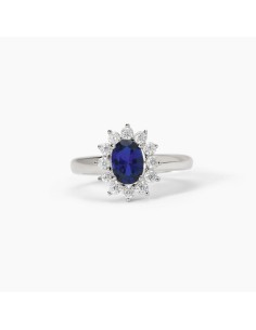 Anillo de plata con circonita azul y orla de circonitas transparentes